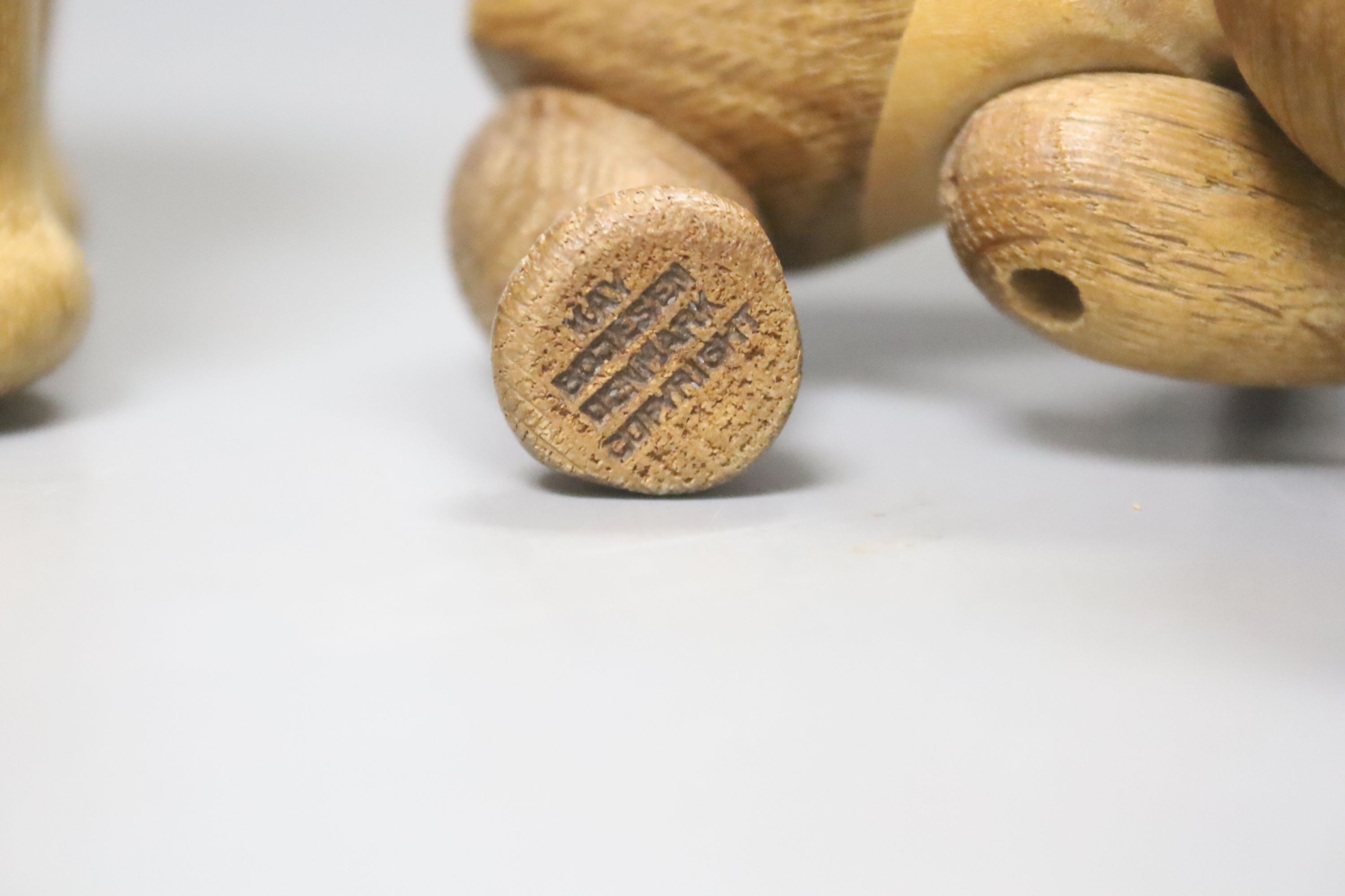 Two Danish carved wooden toys by Kay Bogesen, a standing elephant, 22cm length 14cm high and a seated bear, 10cm high